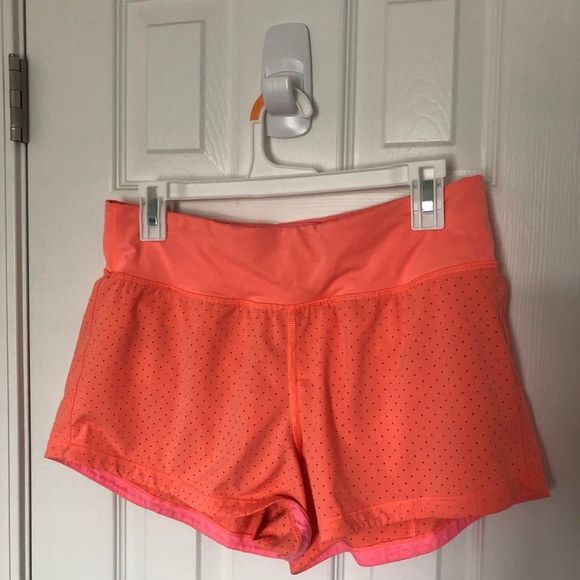 Neon orange Lululemon shorts - Picture 1 of 2